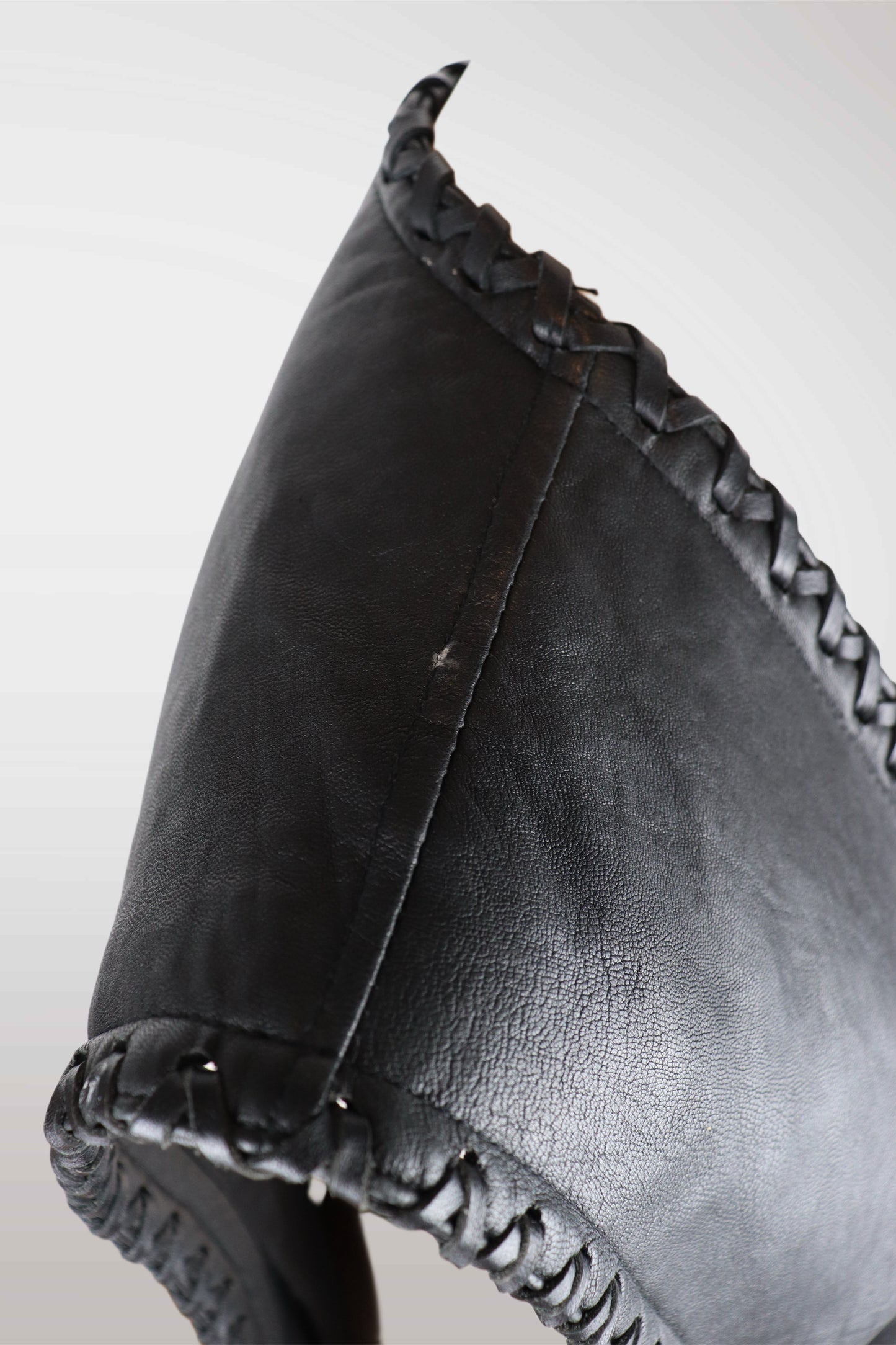 Black leather hood with frayed edge on a white background
mint condition vintage
designer archive piece
rare runway sample
one of a kind vintage
limited edition designer
authentic vintage designer
rare vintage designer find
collectible vintage fashion
high-end vintage clothing
luxury vintage apparel
designer vintage statement piece
genuine vintage couture
archival designer clothing
runway vintage fashion
vintage designer investment piece