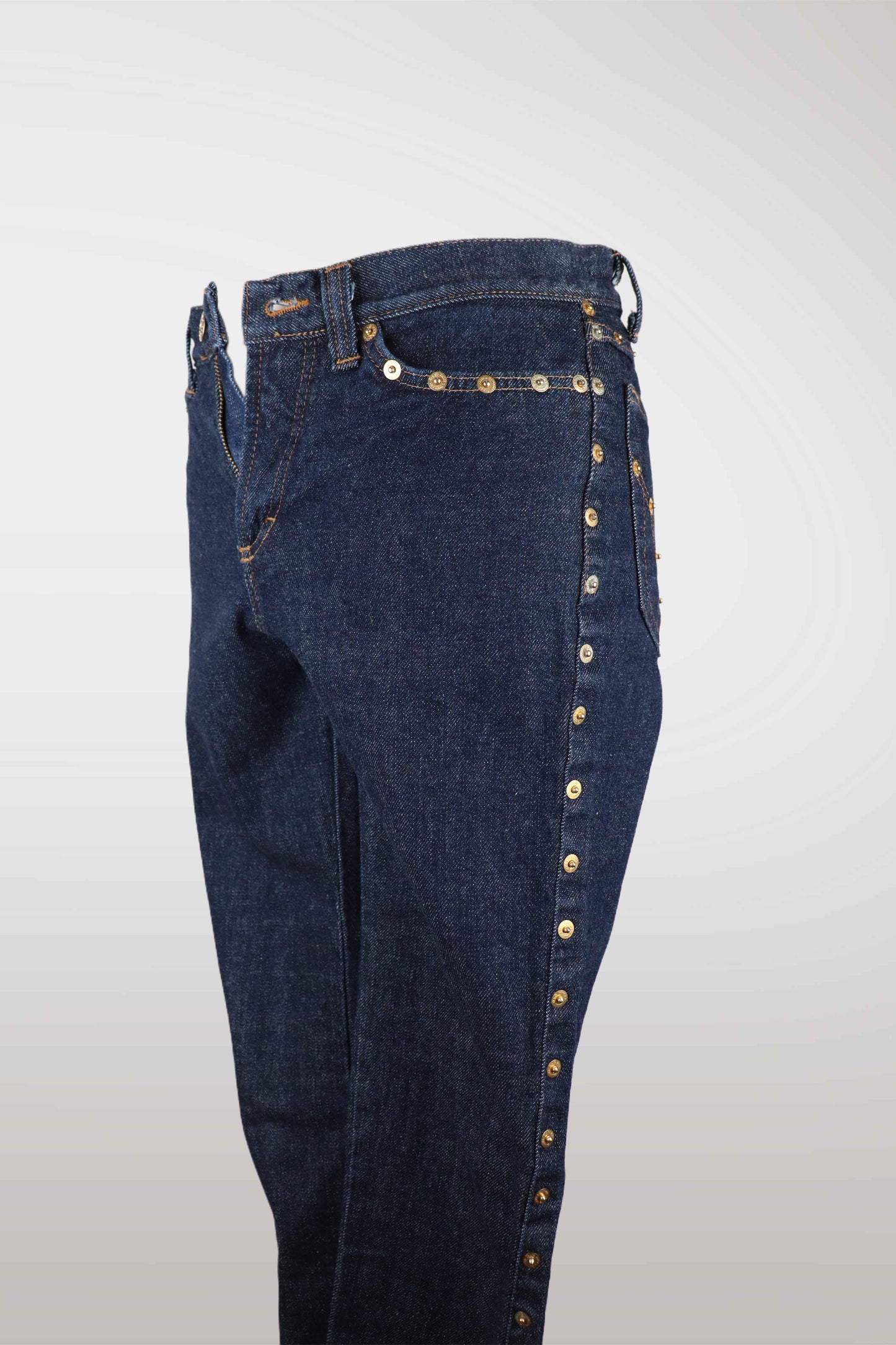 Dark blue jeans with gold buttons on a light gray backgroundmint condition vintage
designer archive piece
rare runway sample
one of a kind vintage
limited edition designer
authentic vintage designer
rare vintage designer find
collectible vintage fashion
high-end vintage clothing
luxury vintage apparel
designer vintage statement piece
genuine vintage couture
archival designer clothing
runway vintage fashion
vintage designer investment piece