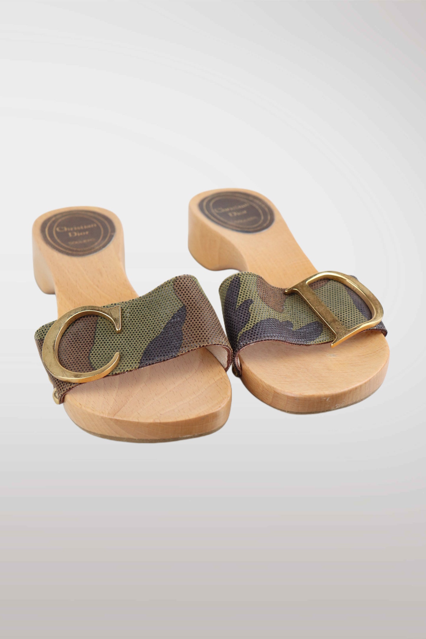 Wooden sandals with camouflage straps on a light gray background
mint condition vintage
designer archive piece
rare runway sample
one of a kind vintage
limited edition designer
authentic vintage designer
rare vintage designer find
collectible vintage fashion
high-end vintage clothing
luxury vintage apparel
designer vintage statement piece
genuine vintage couture
archival designer clothing
runway vintage fashion
vintage designer investment piece