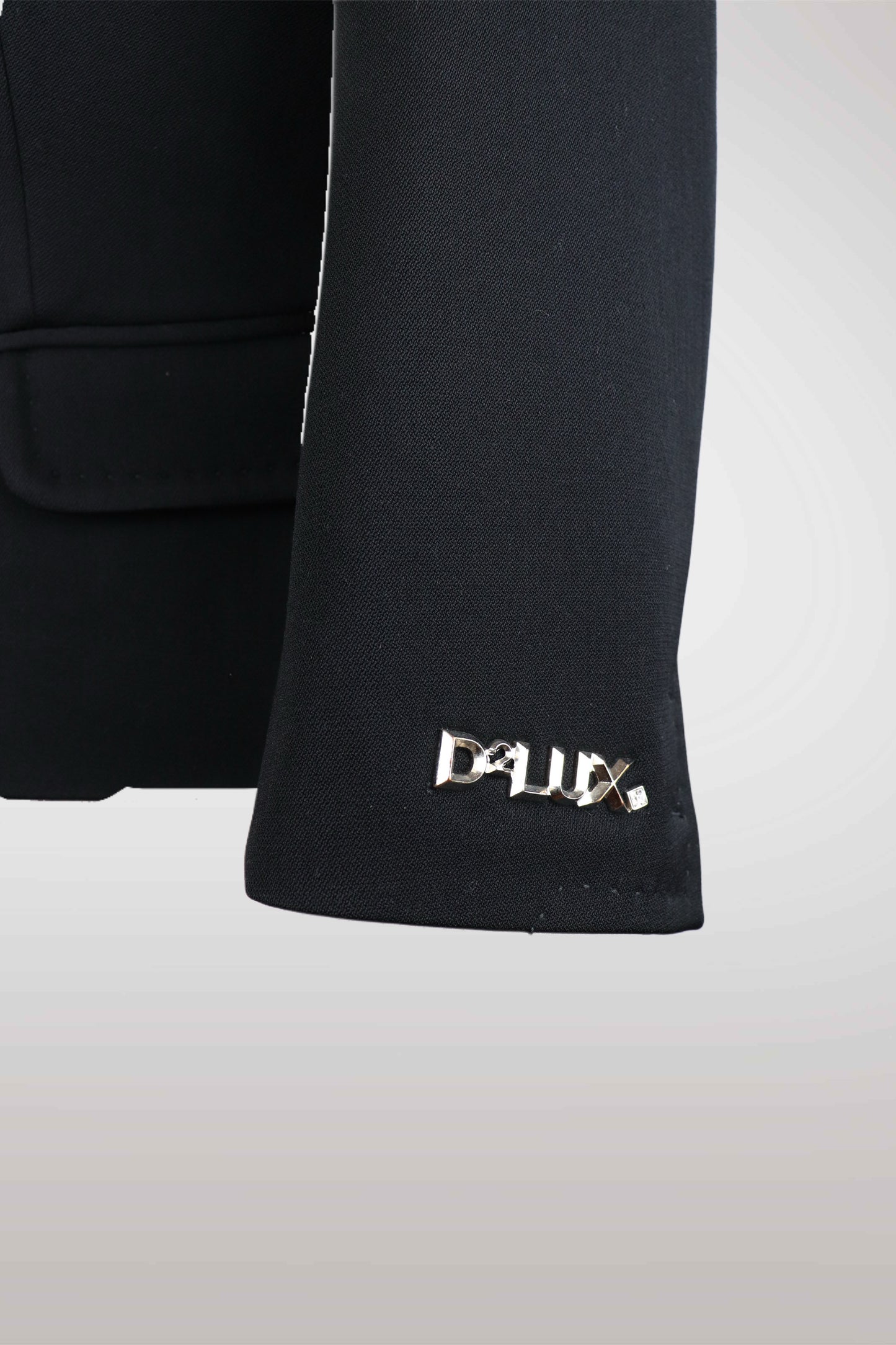 Black sleeve with a brand logo on a white background
mint condition vintage
designer archive piece
rare runway sample
one of a kind vintage
limited edition designer
authentic vintage designer
rare vintage designer find
collectible vintage fashion
high-end vintage clothing
luxury vintage apparel
designer vintage statement piece
genuine vintage couture
archival designer clothing
runway vintage fashion
vintage designer investment piece