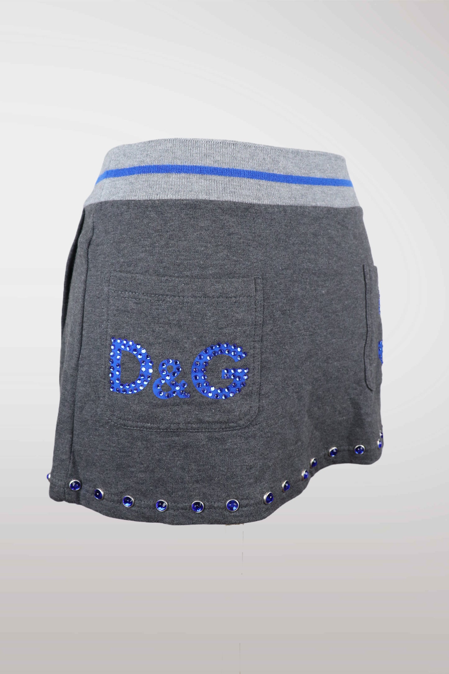 Gray shorts with blue accents and 'D&G' logo on a white background
mint condition vintage
designer archive piece
rare runway sample
one of a kind vintage
limited edition designer
authentic vintage designer
rare vintage designer find
collectible vintage fashion
high-end vintage clothing
luxury vintage apparel
designer vintage statement piece
genuine vintage couture
archival designer clothing
runway vintage fashion
vintage designer investment piece
