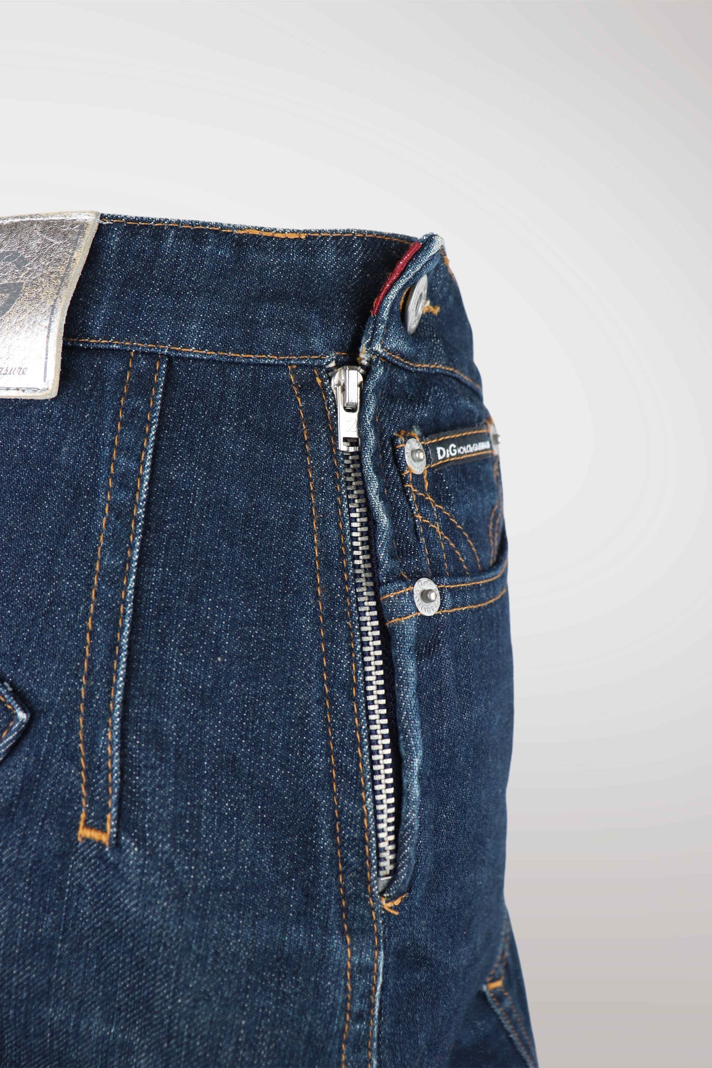 Close-up of blue jeans with a zipper and stitching details on a white background
mint condition vintage
designer archive piece
rare runway sample
one of a kind vintage
limited edition designer
authentic vintage designer
rare vintage designer find
collectible vintage fashion
high-end vintage clothing
luxury vintage apparel
designer vintage statement piece
genuine vintage couture
archival designer clothing
runway vintage fashion
vintage designer investment piece