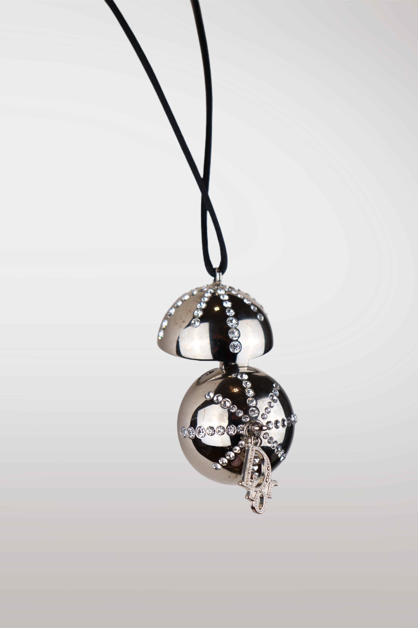 Silver necklace with two spherical pendants on a light gray background
mint condition vintage
designer archive piece
rare runway sample
one of a kind vintage
limited edition designer
authentic vintage designer
rare vintage designer find
collectible vintage fashion
high-end vintage clothing
luxury vintage apparel
designer vintage statement piece
genuine vintage couture
archival designer clothing
runway vintage fashion
vintage designer investment piece