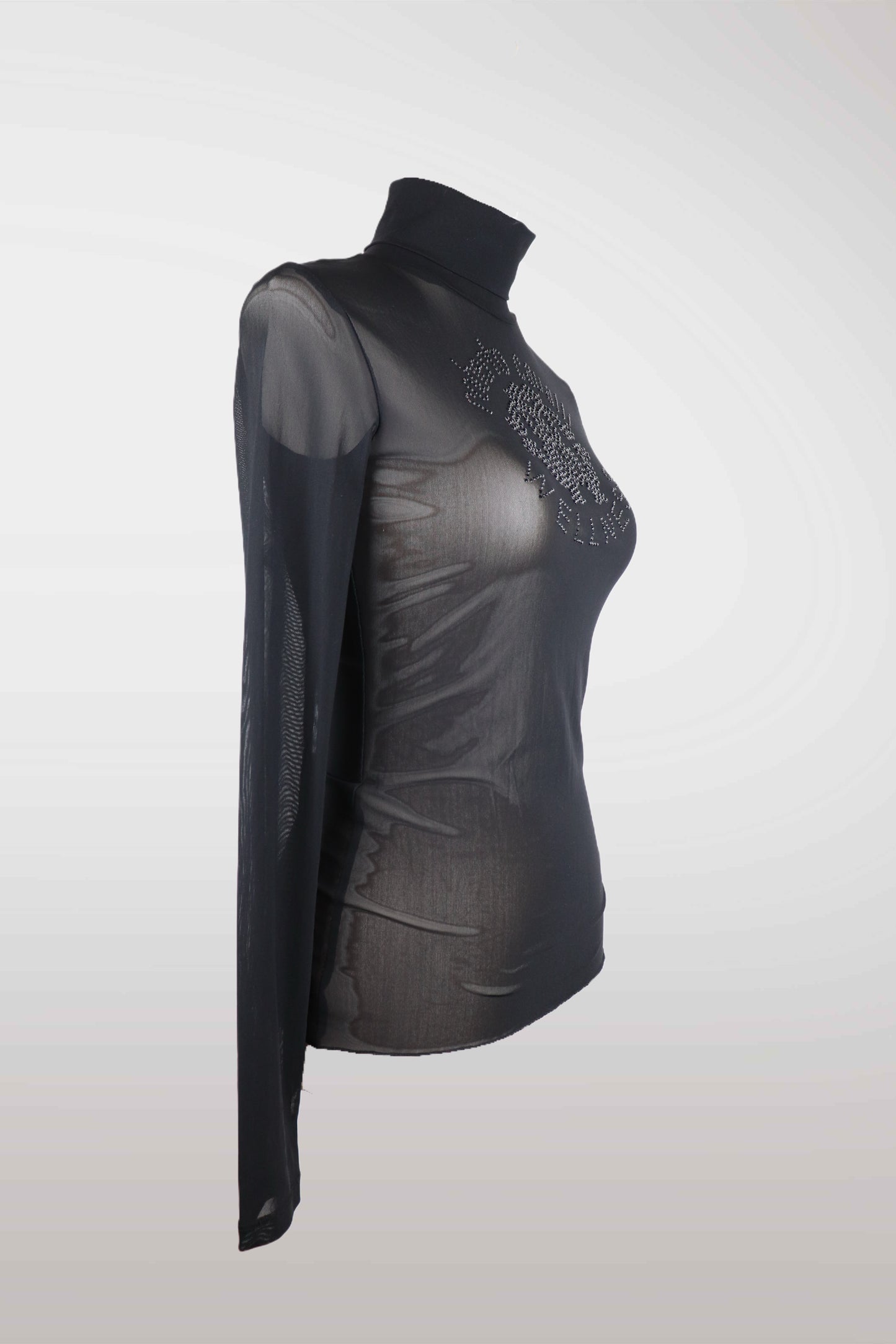 Black turtleneck top with sheer overlay on a mannequin against a white background
mint condition vintage
designer archive piece
rare runway sample
one of a kind vintage
limited edition designer
authentic vintage designer
rare vintage designer find
collectible vintage fashion
high-end vintage clothing
luxury vintage apparel
designer vintage statement piece
genuine vintage couture
archival designer clothing
runway vintage fashion
vintage designer investment piece