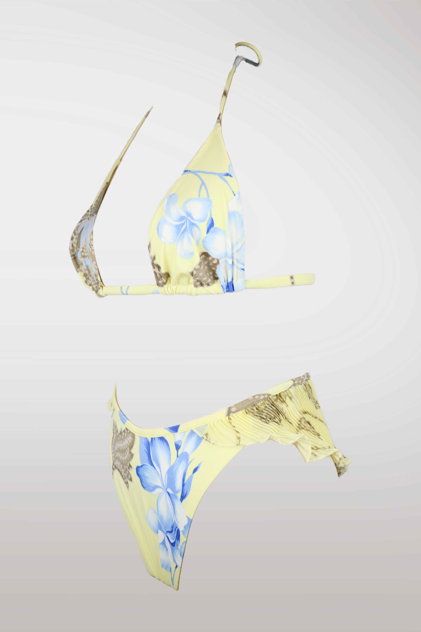 Yellow bikini with floral pattern on a gray background
mint condition vintage
designer archive piece
rare runway sample
one of a kind vintage
limited edition designer
authentic vintage designer
rare vintage designer find
collectible vintage fashion
high-end vintage clothing
luxury vintage apparel
designer vintage statement piece
genuine vintage couture
archival designer clothing
runway vintage fashion
vintage designer investment piece