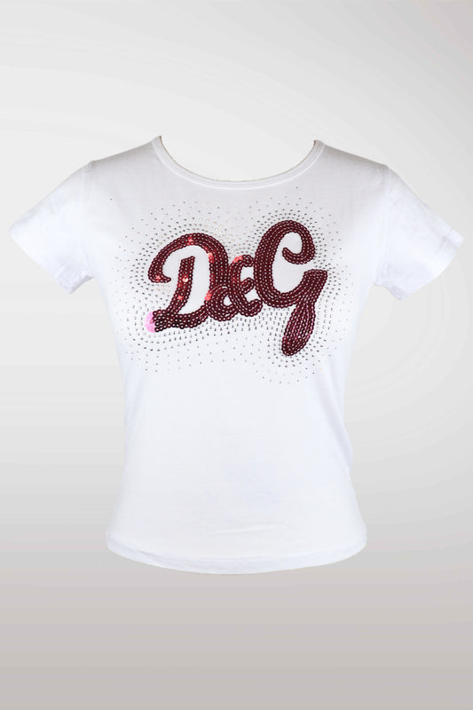 White t-shirt with red 'D&G' logo on a light gray background
mint condition vintage
designer archive piece
rare runway sample
one of a kind vintage
limited edition designer
authentic vintage designer
rare vintage designer find
collectible vintage fashion
high-end vintage clothing
luxury vintage apparel
designer vintage statement piece
genuine vintage couture
archival designer clothing
runway vintage fashion
vintage designer investment piece