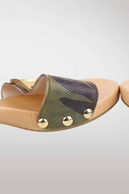 Wooden sandal with green fabric and gold studs on a light gray background
mint condition vintage
designer archive piece
rare runway sample
one of a kind vintage
limited edition designer
authentic vintage designer
rare vintage designer find
collectible vintage fashion
high-end vintage clothing
luxury vintage apparel
designer vintage statement piece
genuine vintage couture
archival designer clothing
runway vintage fashion
vintage designer investment piece