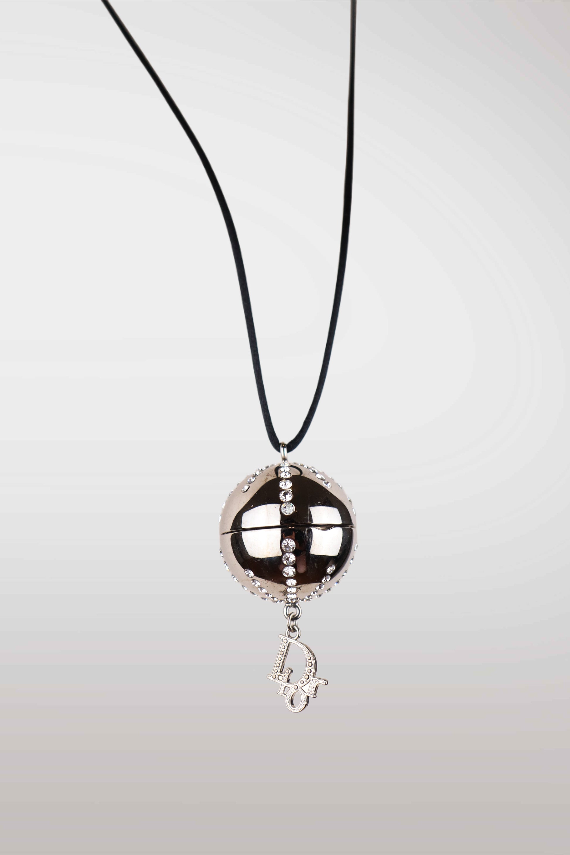 christian dior silver swarovski Necklace with a round pendant on a plain background
mint condition vintage
designer archive piece
rare runway sample
one of a kind vintage
limited edition designer
authentic vintage designer
rare vintage designer find
collectible vintage fashion
high-end vintage clothing
luxury vintage apparel
designer vintage statement piece
genuine vintage couture
archival designer clothing
runway vintage fashion
vintage designer investment piece