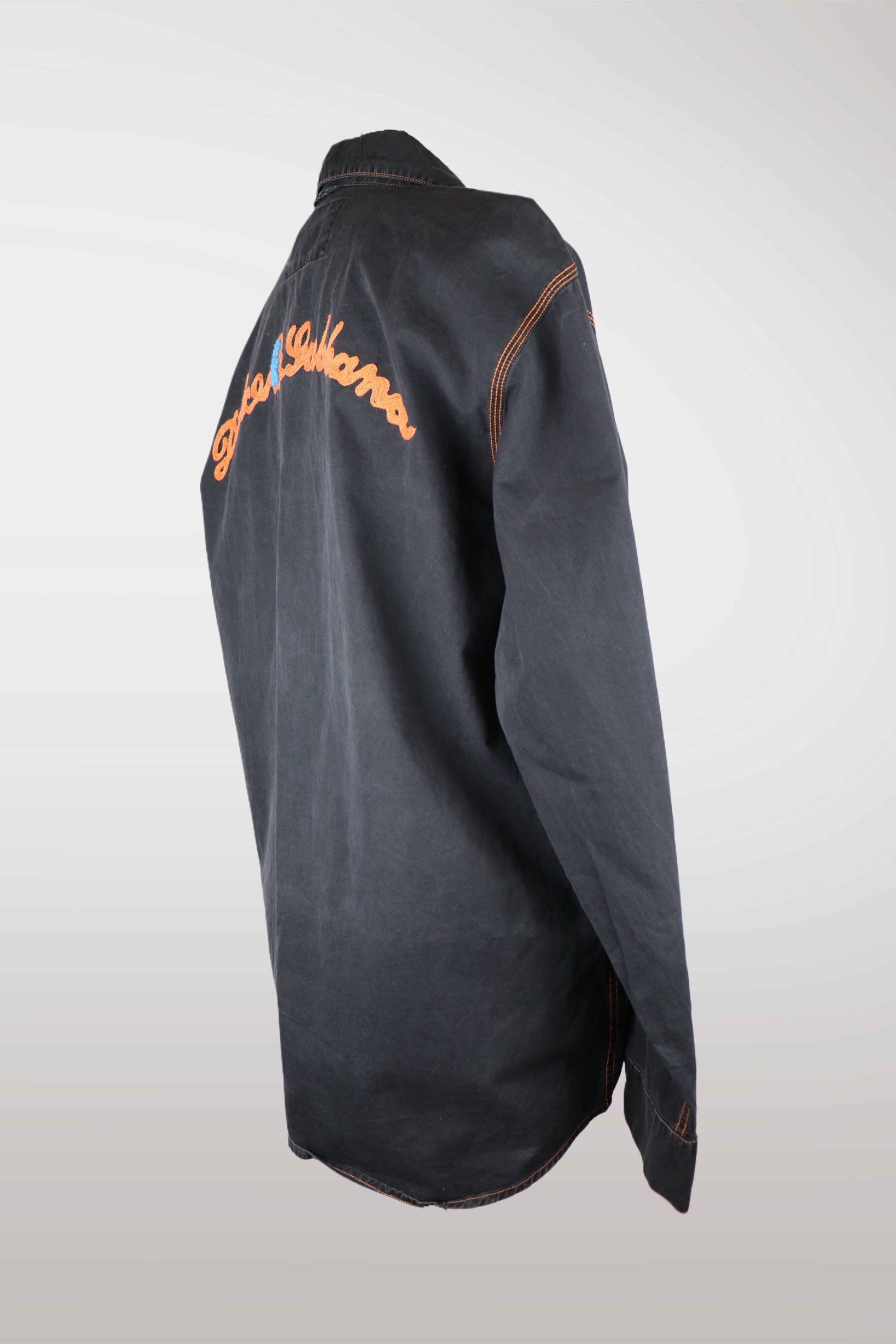 Black dolce & gabbana jacket with orange text on a white background
mint condition vintage
designer archive piece
rare runway sample
one of a kind vintage
limited edition designer
authentic vintage designer
rare vintage designer find
collectible vintage fashion
high-end vintage clothing
luxury vintage apparel
designer vintage statement piece
genuine vintage couture
archival designer clothing
runway vintage fashion
vintage designer investment piece