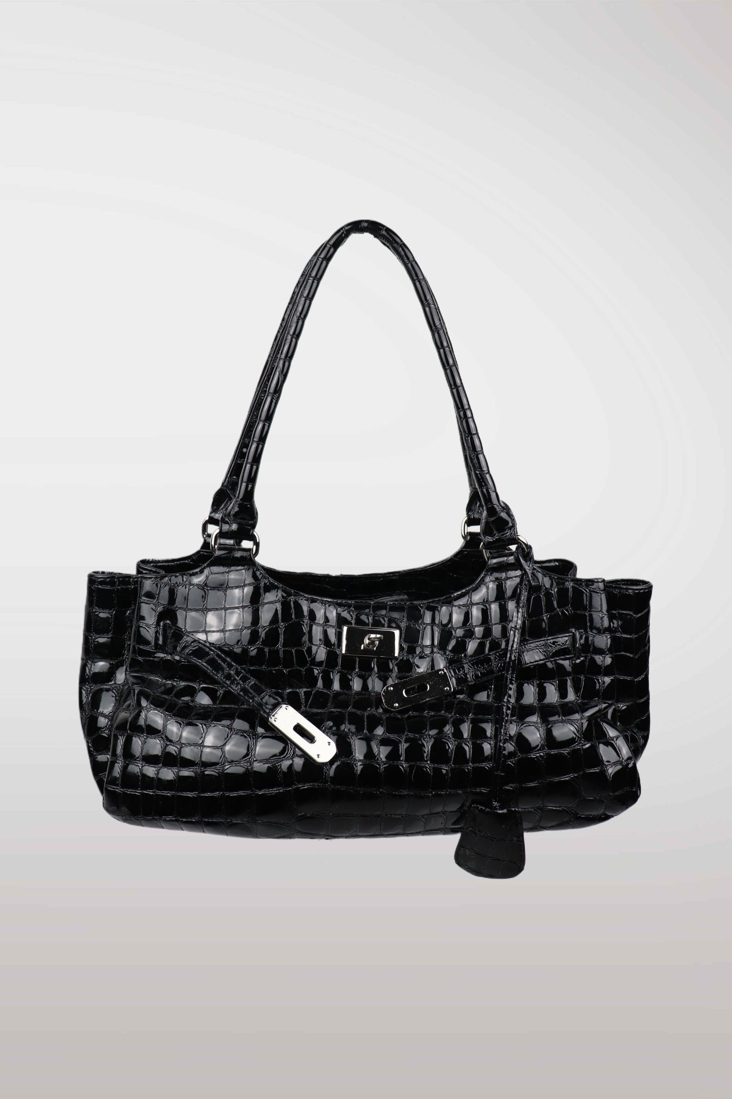 Black textured handbag on a light gray background