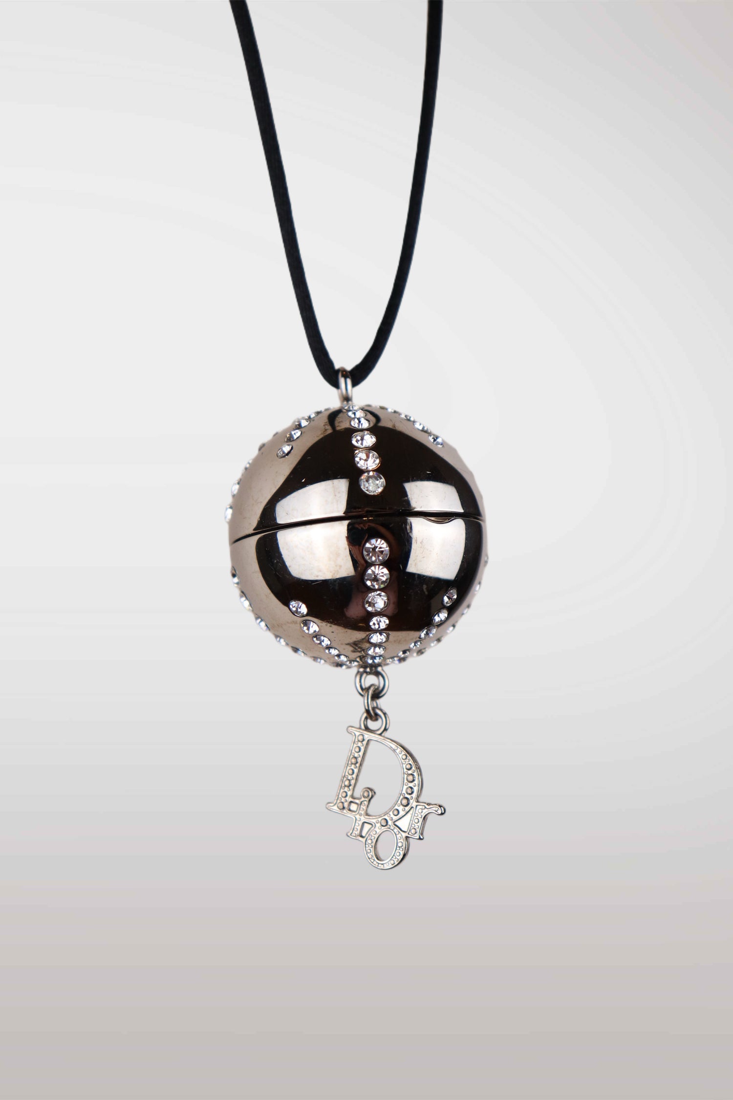 Necklace with a large round pendant and a smaller heart-shaped pendant on a white background
mint condition vintage
designer archive piece
rare runway sample
one of a kind vintage
limited edition designer
authentic vintage designer
rare vintage designer find
collectible vintage fashion
high-end vintage clothing
luxury vintage apparel
designer vintage statement piece
genuine vintage couture
archival designer clothing
runway vintage fashion
vintage designer investment piece